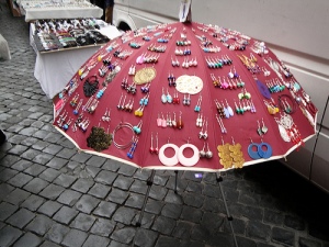 An old Umbrella is very unique way to display earrings etc.