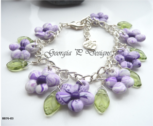Polymer clay purple & white flower charm bracelet